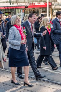 Goteborg, Sweden - May 1, 2016: A happy Swedish Prime Minister Stefan Lofven with his wife walking in the May 1 protest march in Gothenburg city in 2016.